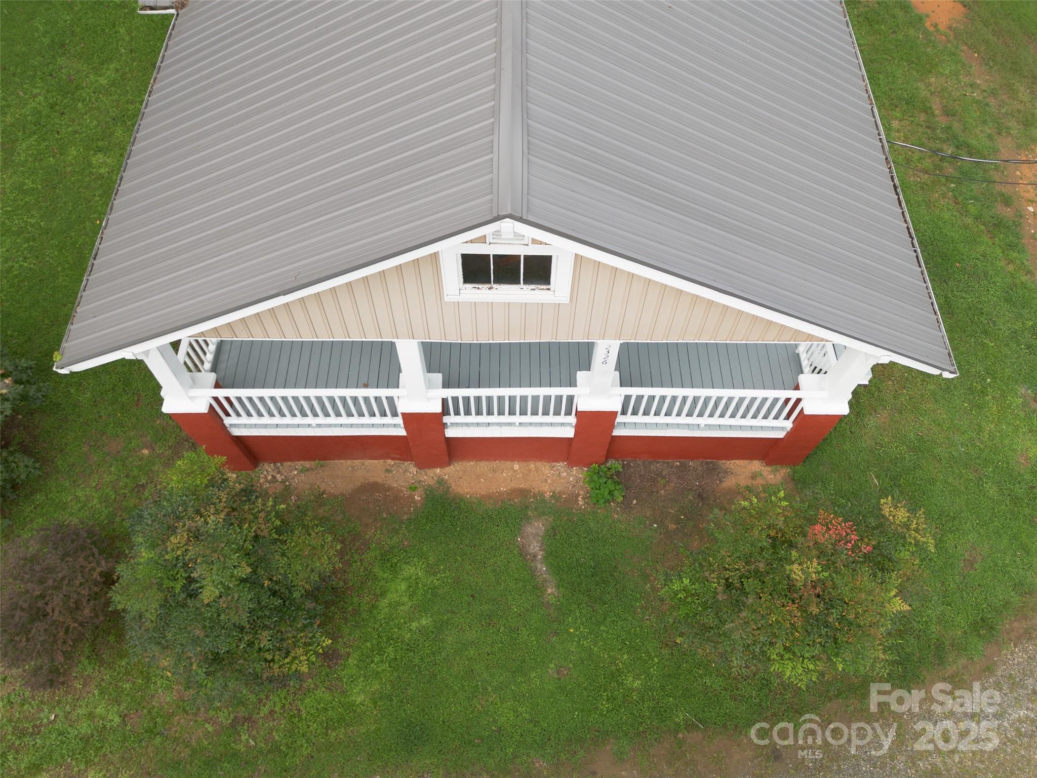 2326 Morganton Boulevard Southwest Lenoir, NC 28645 - Photo 33 of 34 a view of a house with a yard and deck