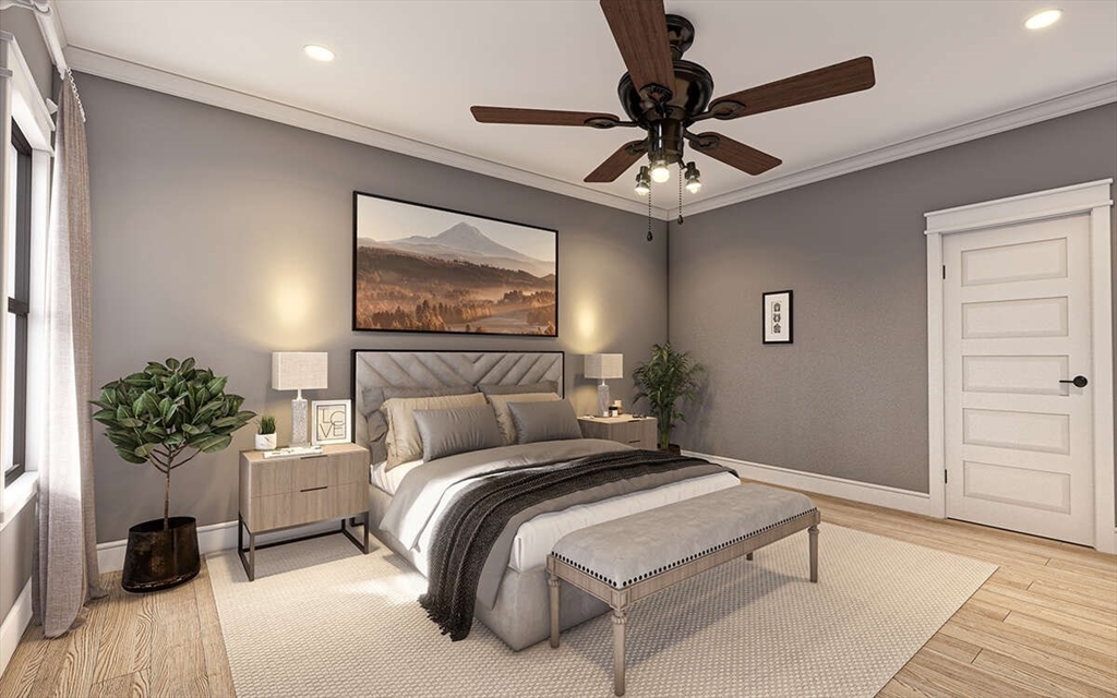 121 Cumberland Road Leominster, MA 01453 - Photo 5 of 12 a bedroom with a bed and a potted plant