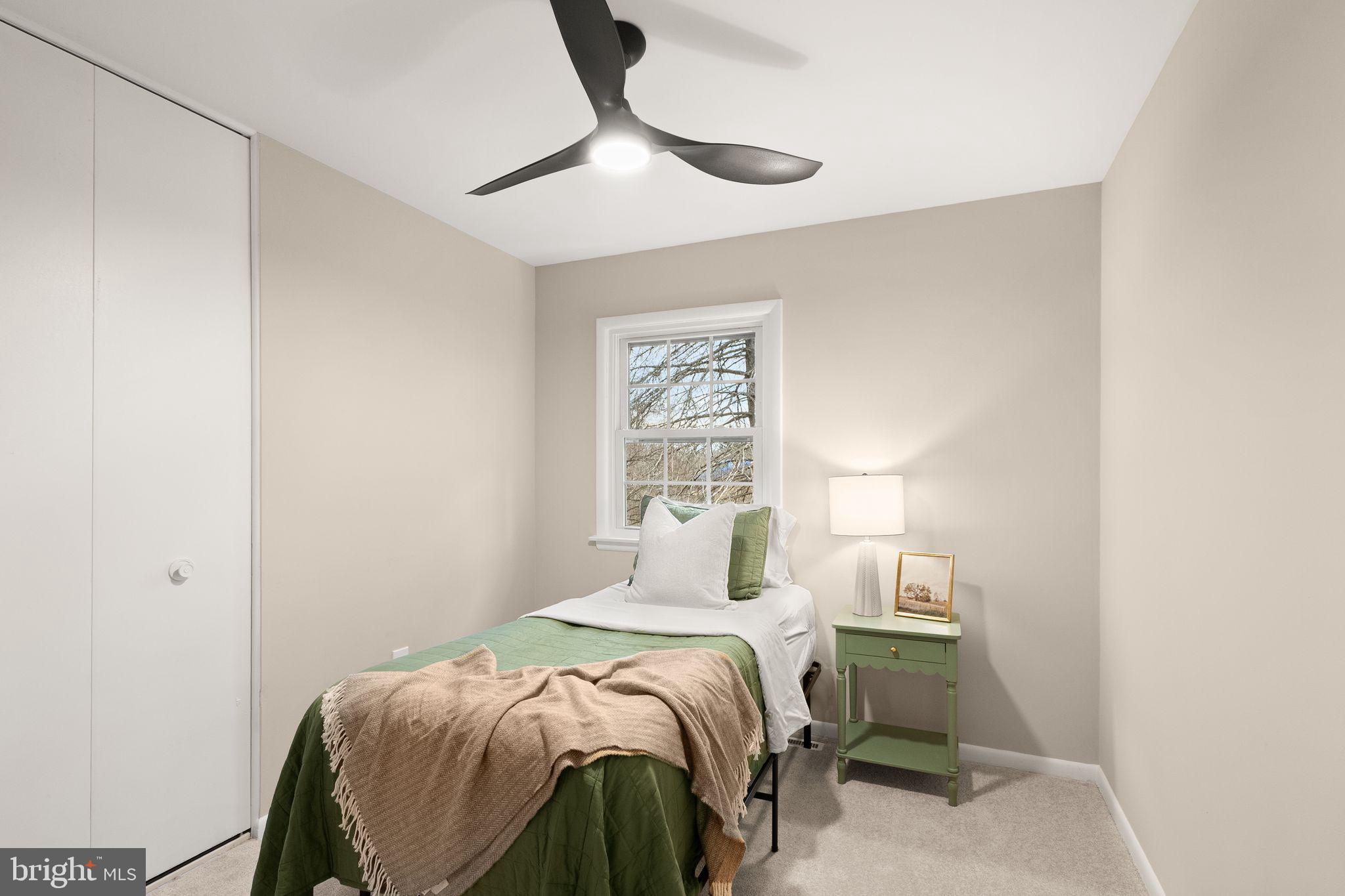 12412 Needle Drive Clarksburg, MD 20871 - Photo 21 of 51 a bedroom with a bed and a window