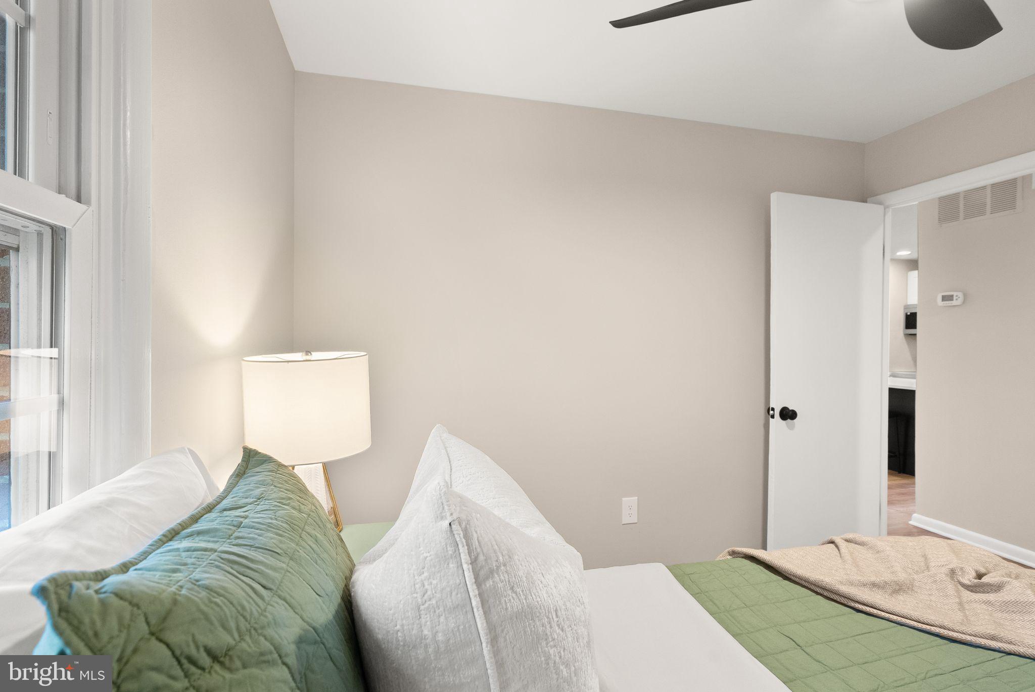 12412 Needle Drive Clarksburg, MD 20871 - Photo 22 of 51 a living room with a couch and a table