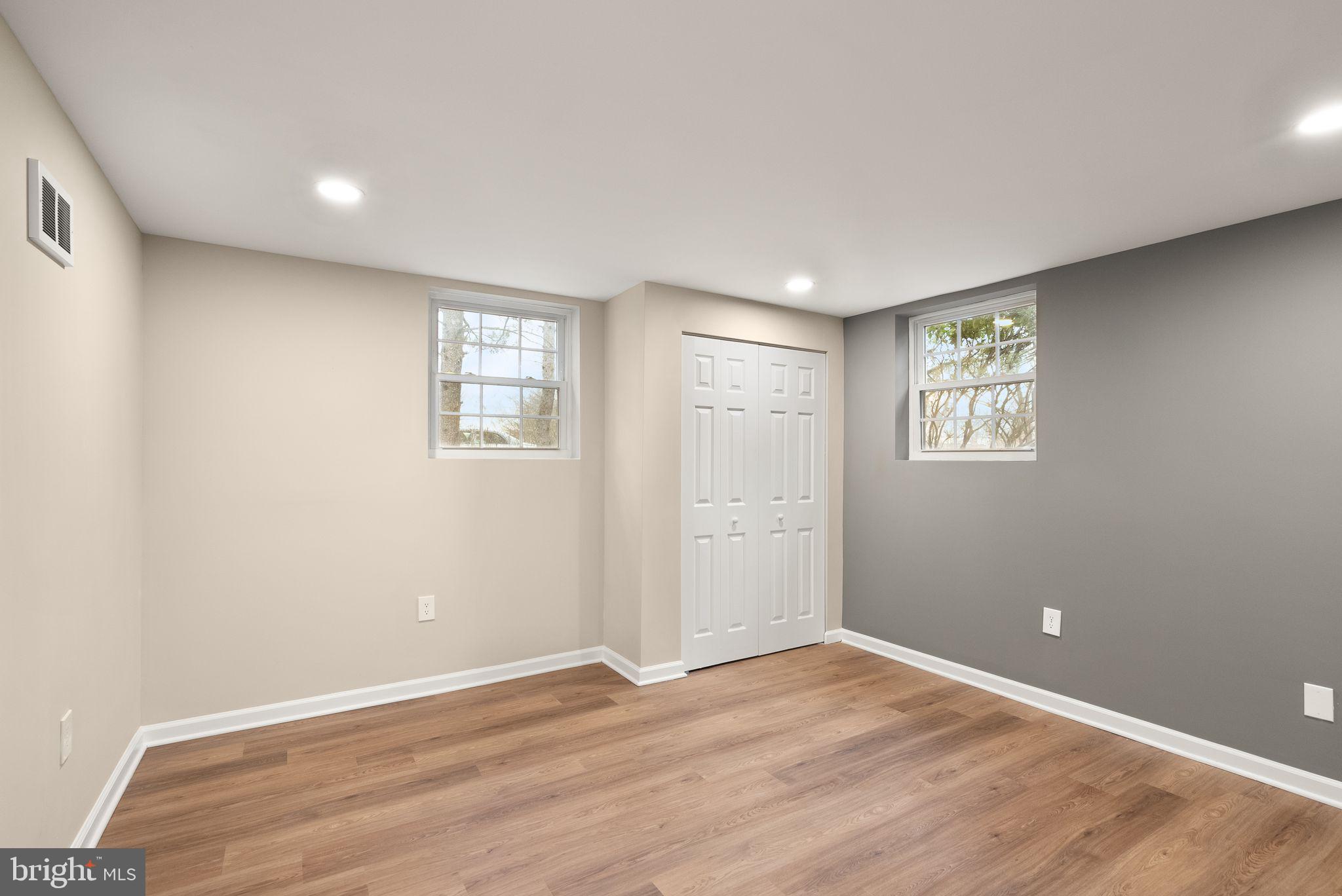 12412 Needle Drive Clarksburg, MD 20871 - Photo 33 of 51 an empty room with windows and closet