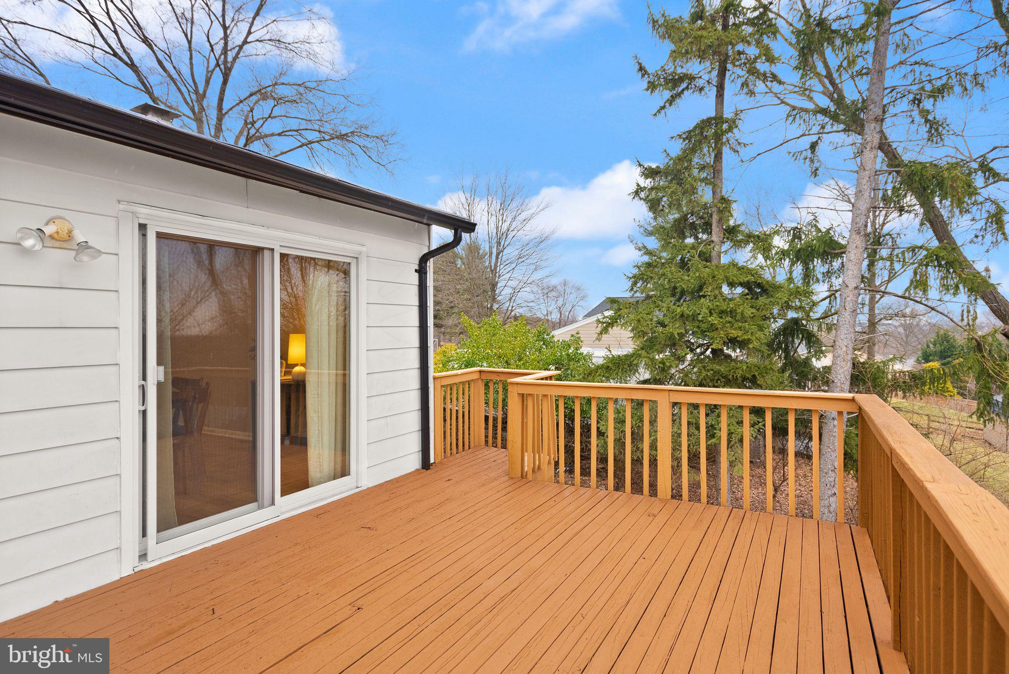 12412 Needle Drive Clarksburg, MD 20871 - Photo 43 of 51 a balcony with wooden floor and fence