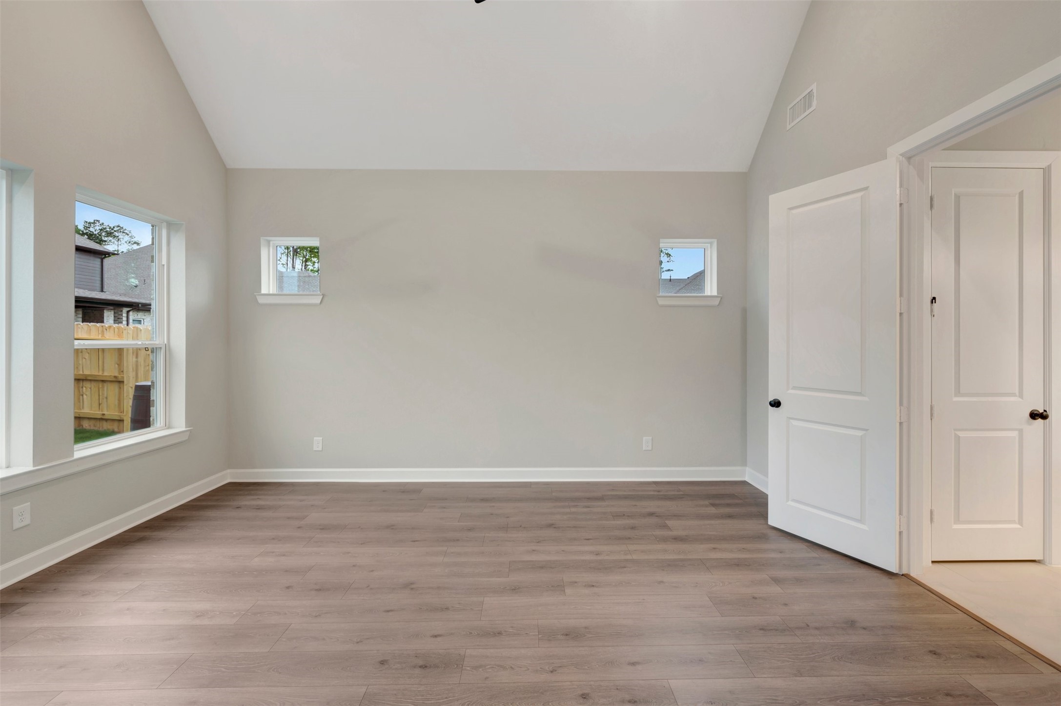 15722 Terracotta Terrace Conroe, TX 77302 - Photo 41 of 50 wooden floor in an empty room