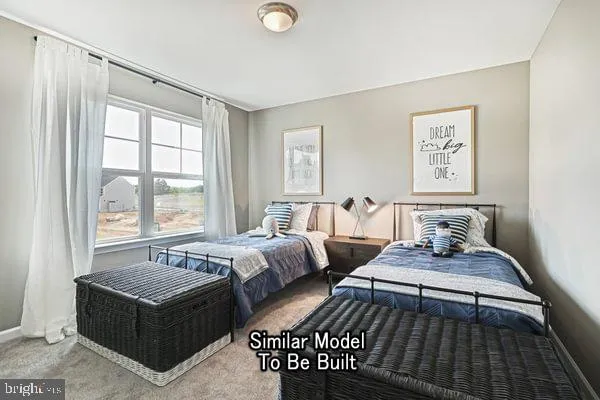 a bedroom with two beds and a large window
