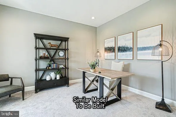 a view of a livingroom with furniture and a window