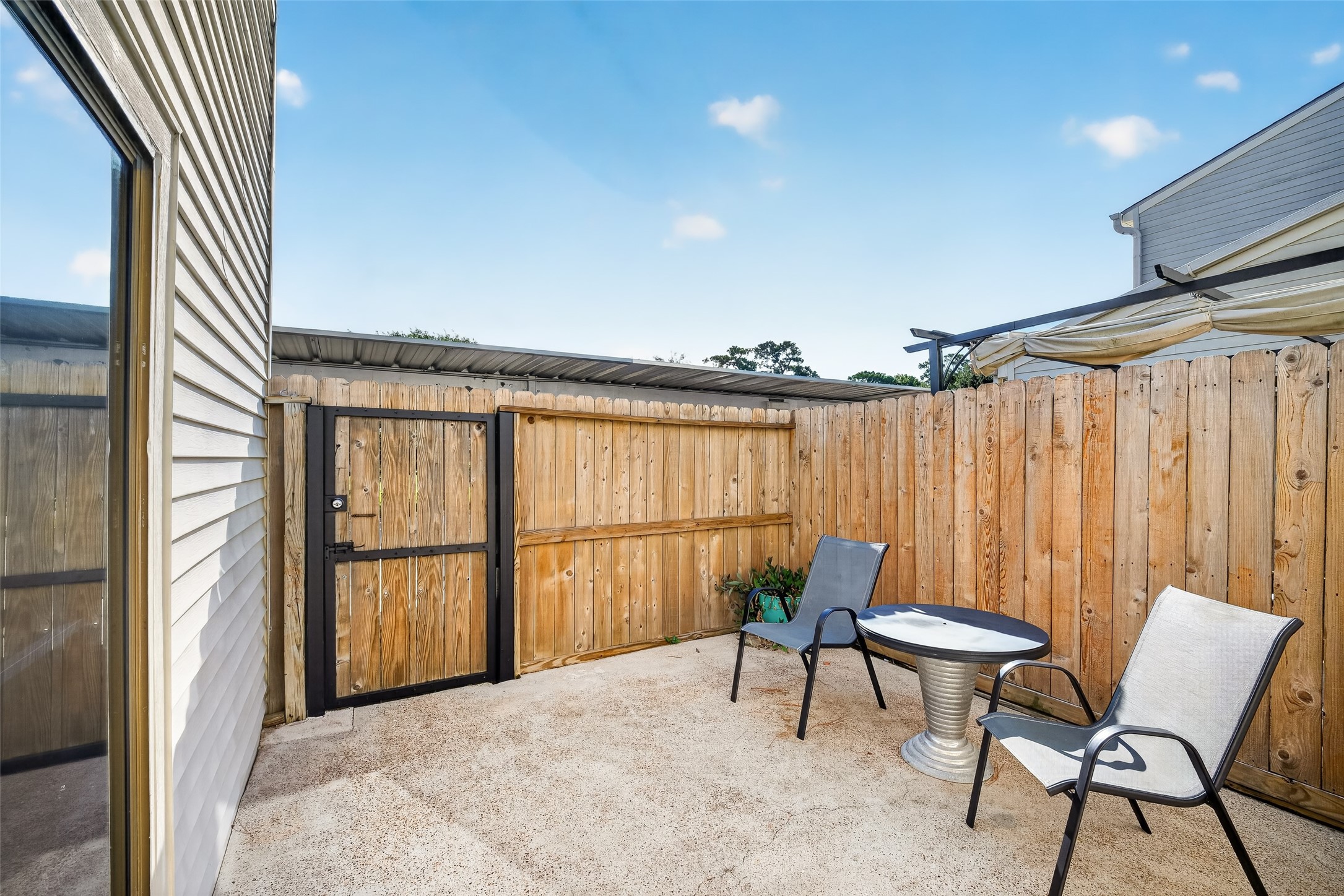 6401 Deihl Road, Unit 301 Houston, TX 77092 - Photo 21 of 31 Great back patio outdoor area to enjoy a cup of coffee or a glass of wine.