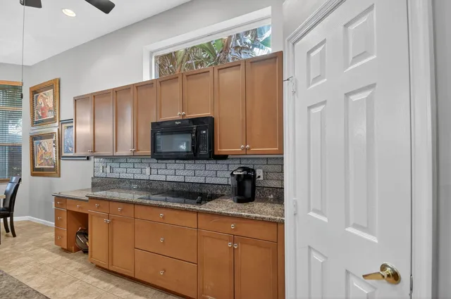 a outdoor living space with furniture and a potted plant
