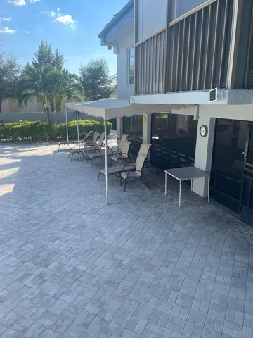 a view of a park with large trees