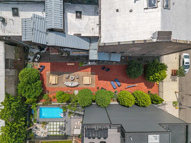 a front view of a building with many windows