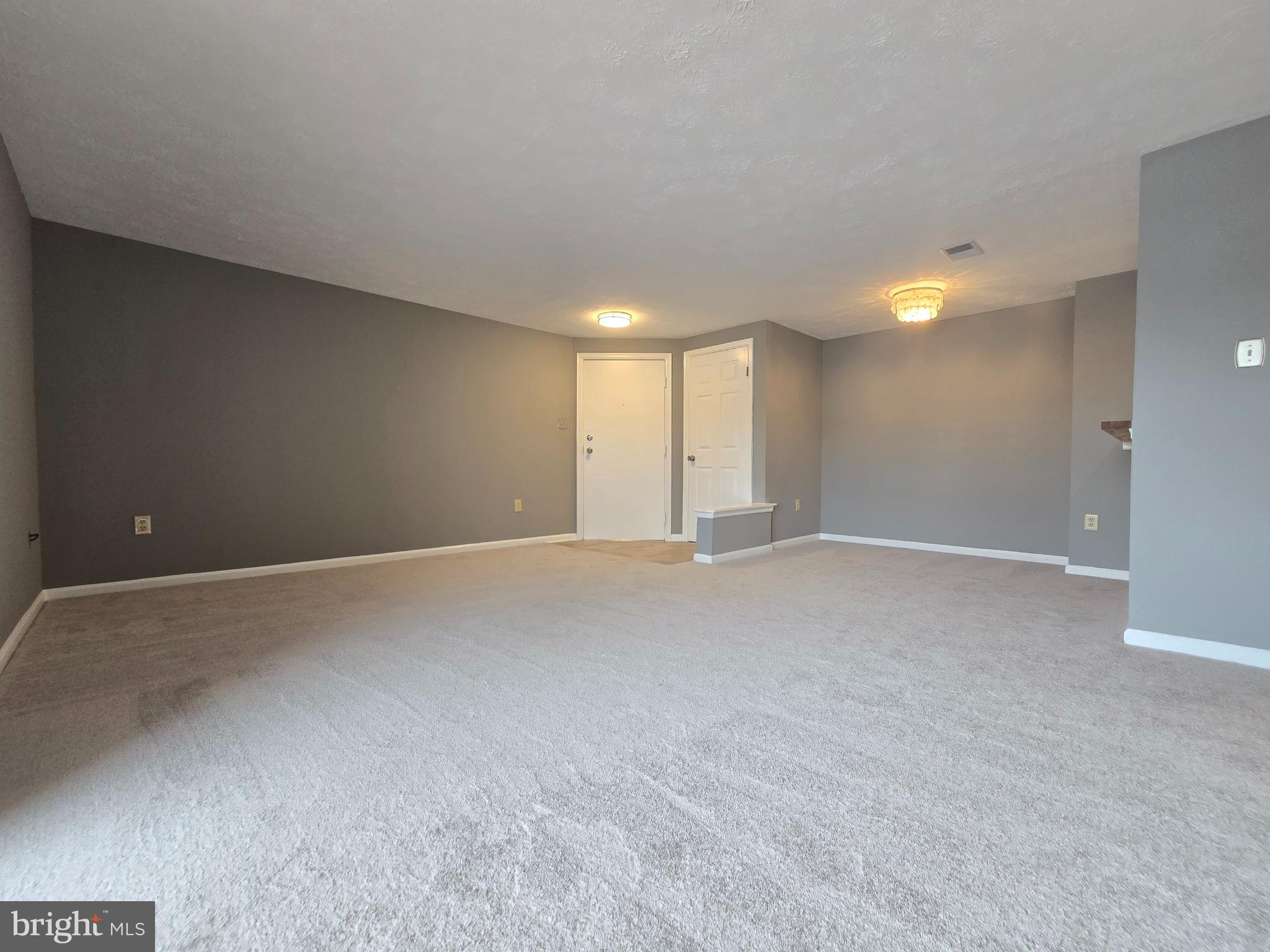 821 Stratford Way, Unit H Frederick, MD 21701 - Photo 2 of 45 a view of an empty room