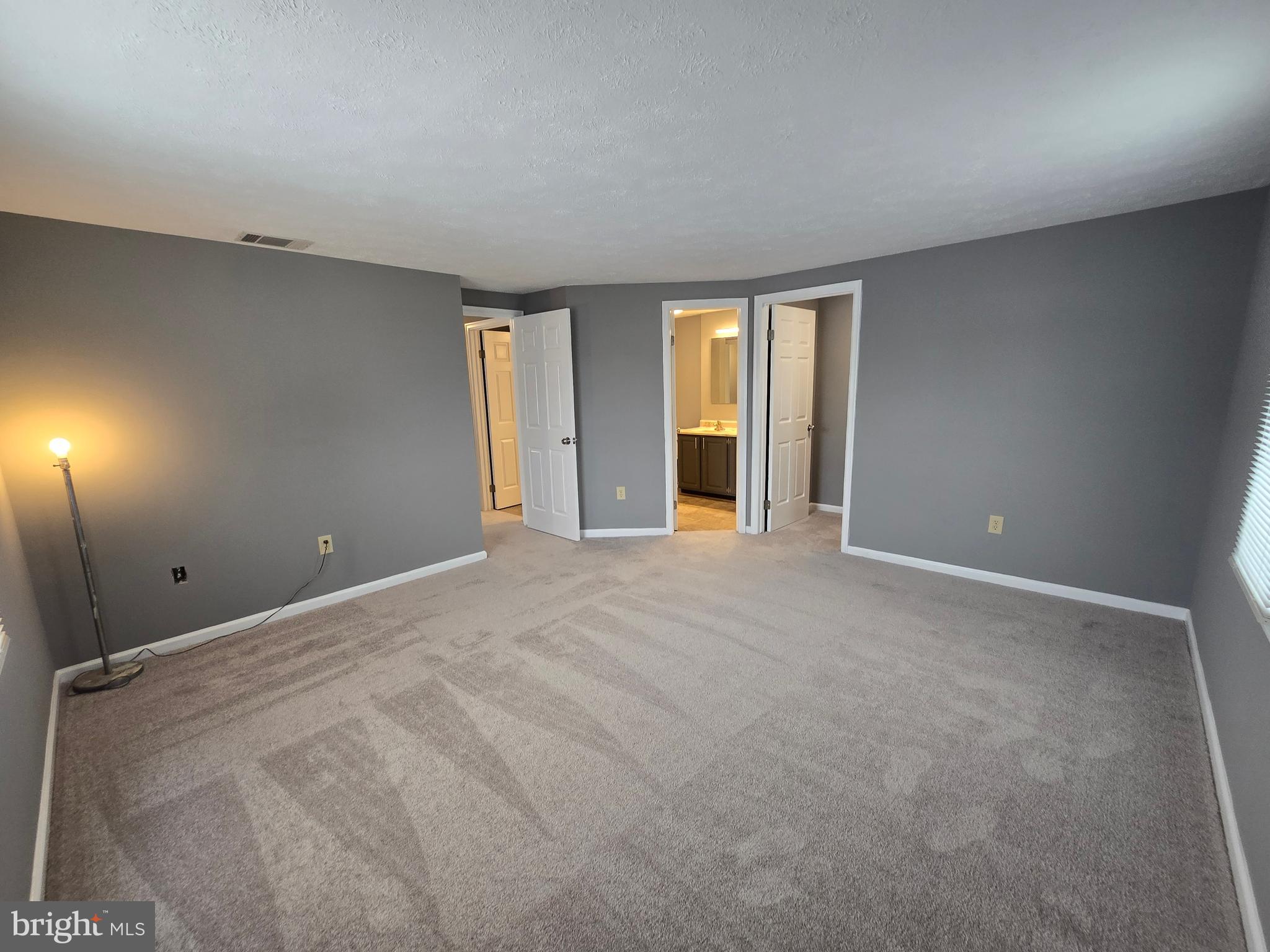 821 Stratford Way, Unit H Frederick, MD 21701 - Photo 26 of 45 a view of an empty room with a window