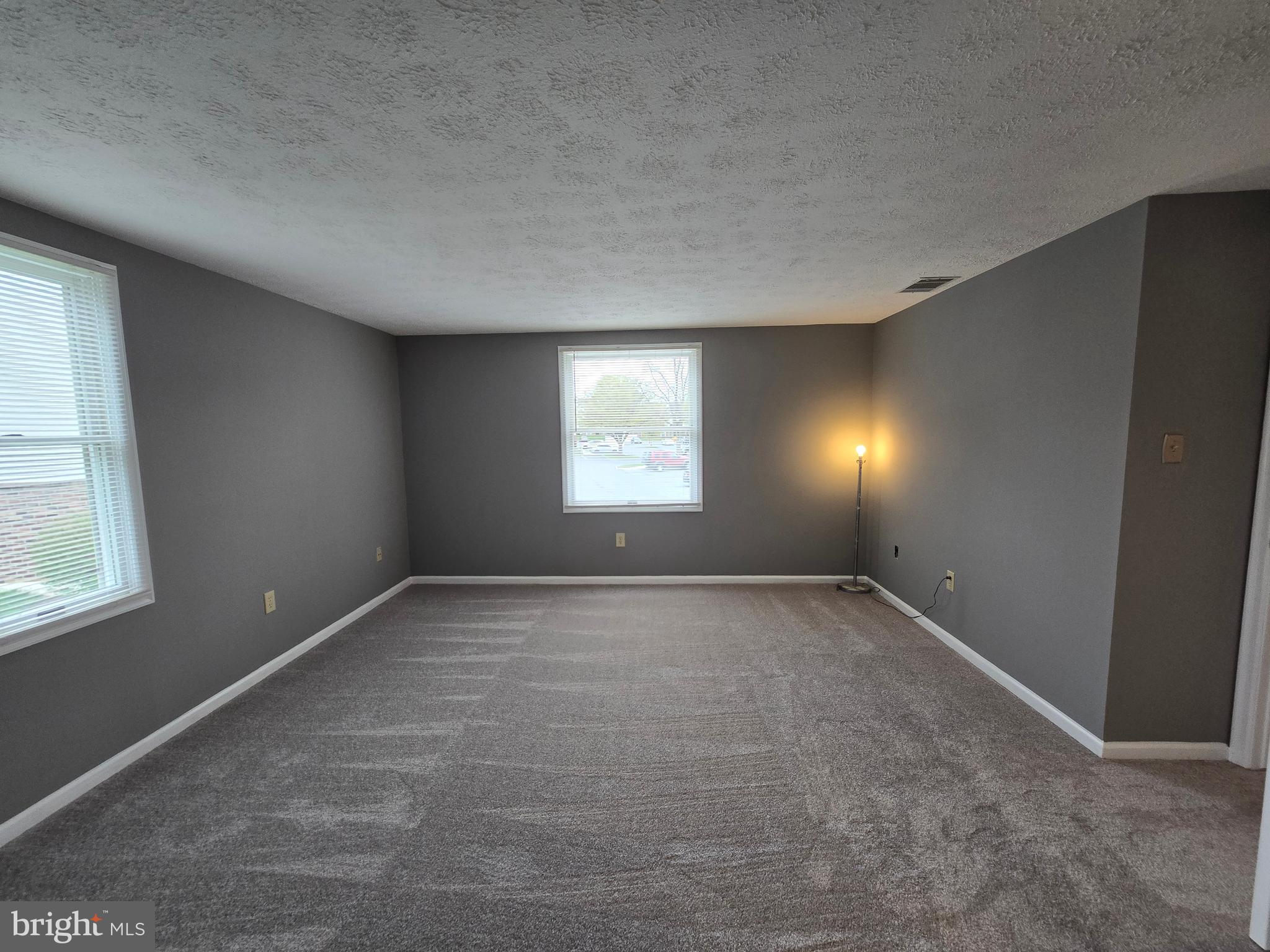 821 Stratford Way, Unit H Frederick, MD 21701 - Photo 28 of 45 an empty room with a window