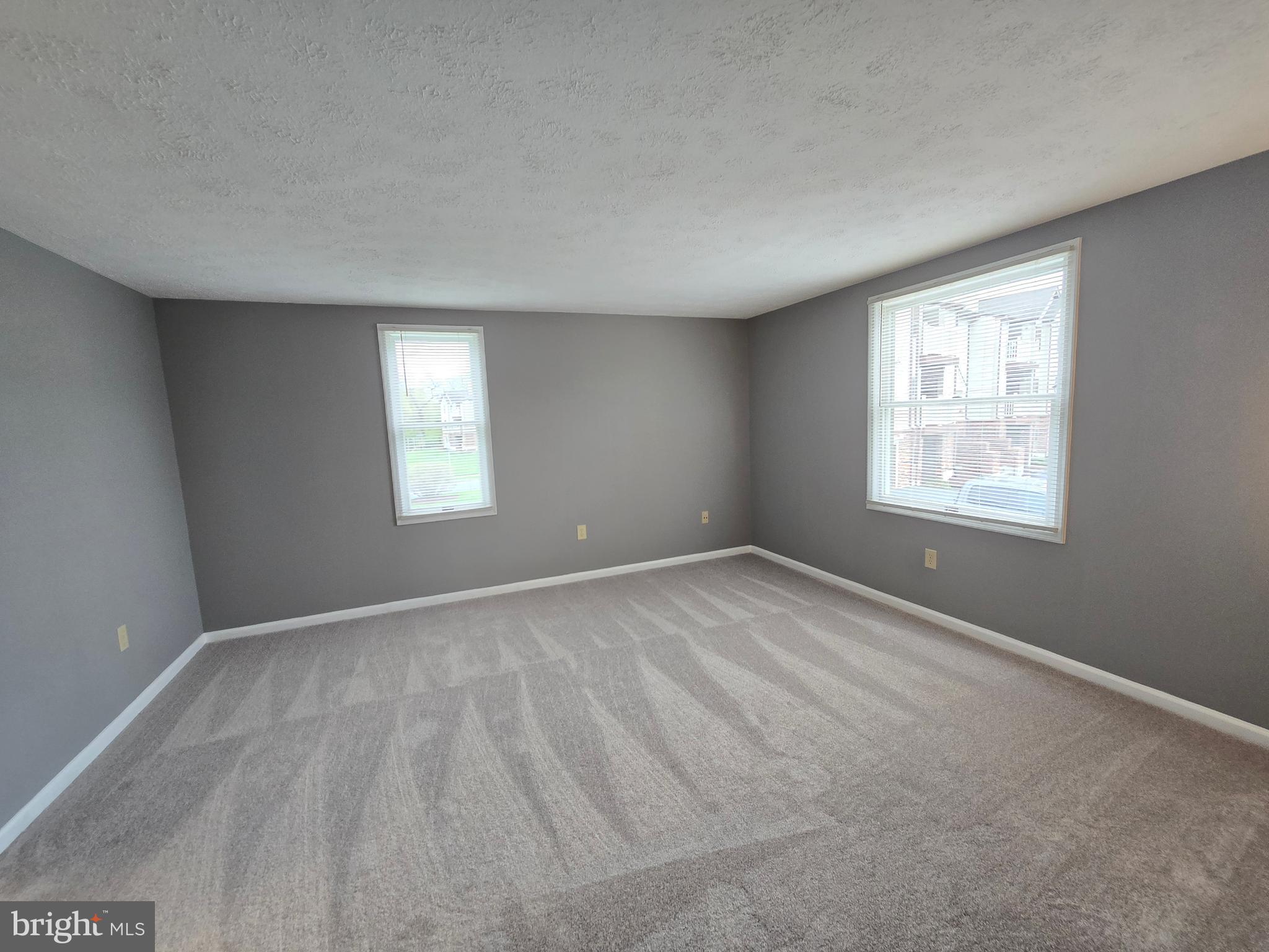 821 Stratford Way, Unit H Frederick, MD 21701 - Photo 29 of 45 an empty room with a window