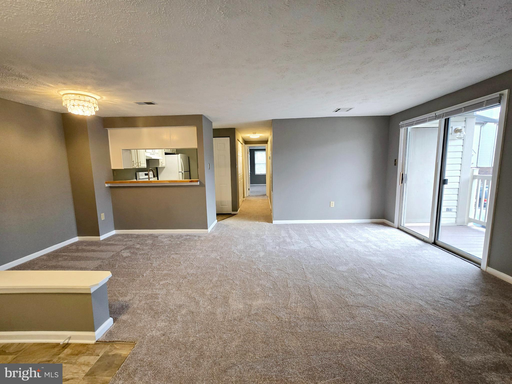 821 Stratford Way, Unit H Frederick, MD 21701 - Photo 3 of 45 a view of an empty room with a window
