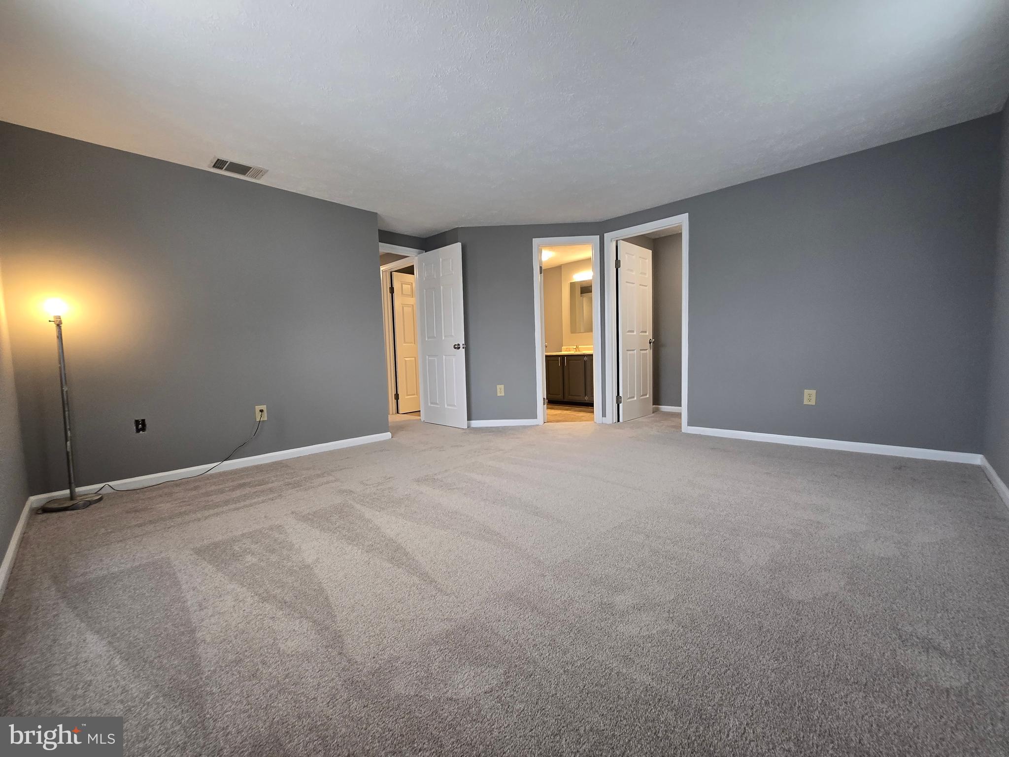 821 Stratford Way, Unit H Frederick, MD 21701 - Photo 31 of 45 a view of an empty room with a window