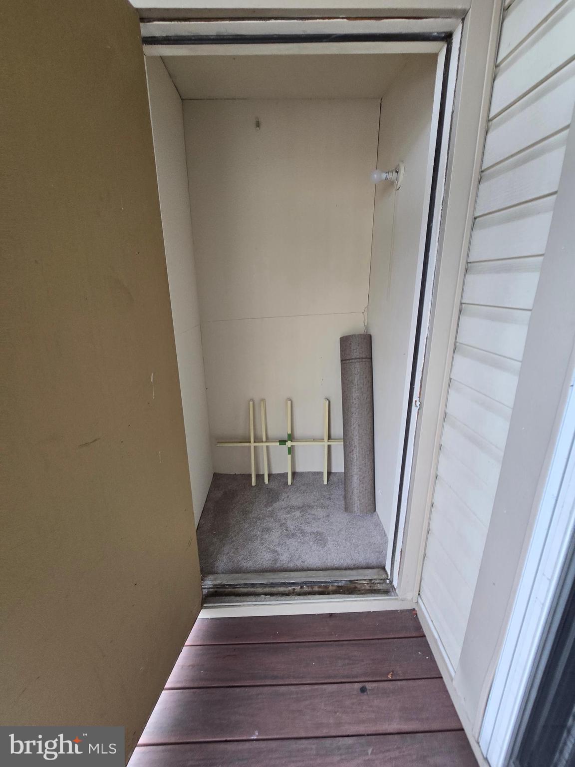 821 Stratford Way, Unit H Frederick, MD 21701 - Photo 45 of 45 a view of staircase with white door and chair