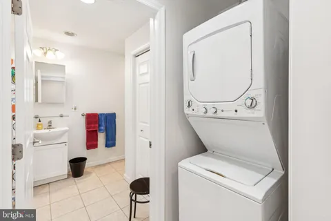 a bathroom with a toilet and a sink