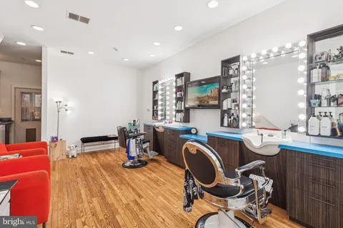a view of a kitchen with workspace and a window