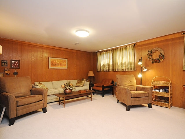 739 Juniper Road Glenview, IL 60025 - Photo 15 of 21 a living room with furniture and a couch