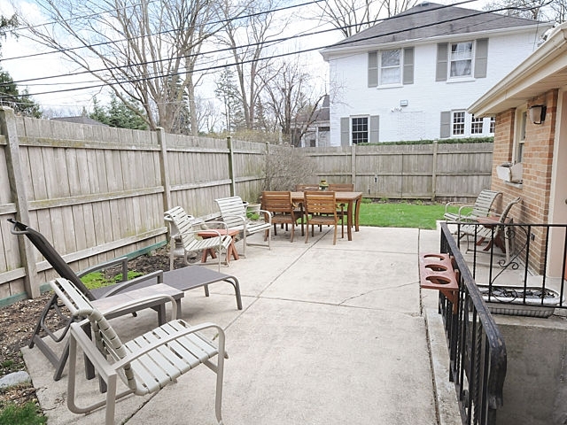 739 Juniper Road Glenview, IL 60025 - Photo 18 of 21 a view of a patio with a table and chairs