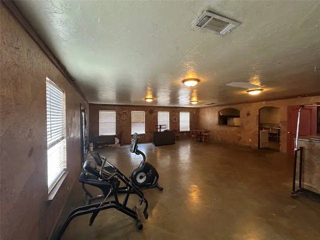 a view of a room with gym equipment
