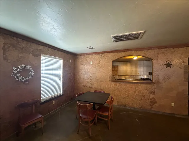 a room with furniture and a window