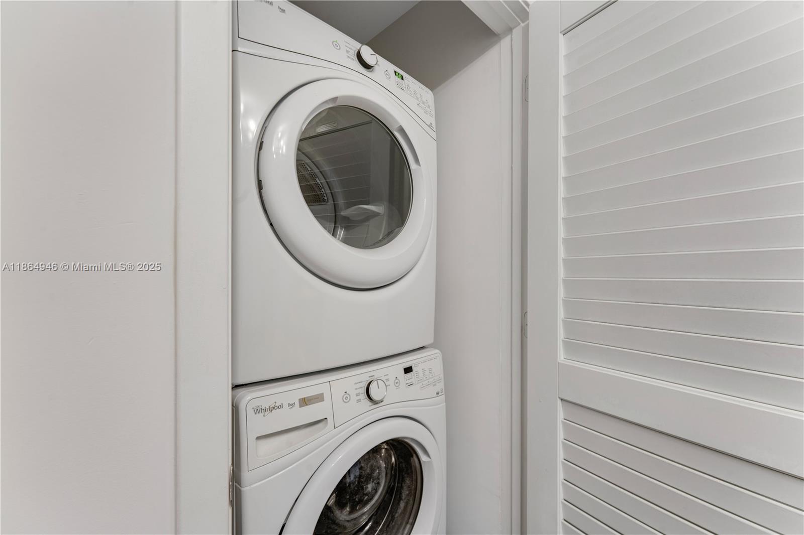 88 Southwest 7th Street, Unit 2910 Miami, FL 33130 - Photo 19 of 22 a close up view of a washer and dryer