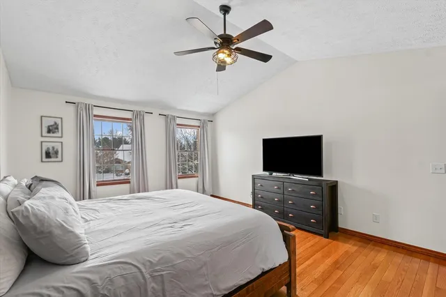 a bathroom with a shower and a toilet