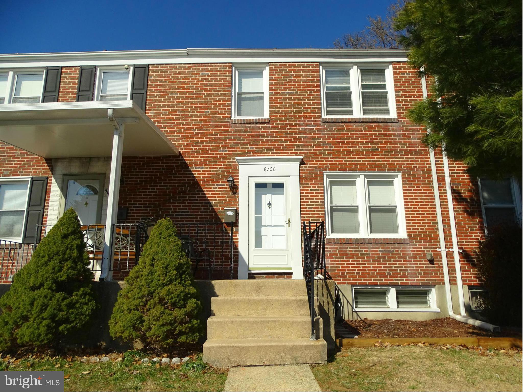 6106 Mt Ridge Road Catonsville, MD 21228 - Photo 1 of 30 a front view of a house with a yard