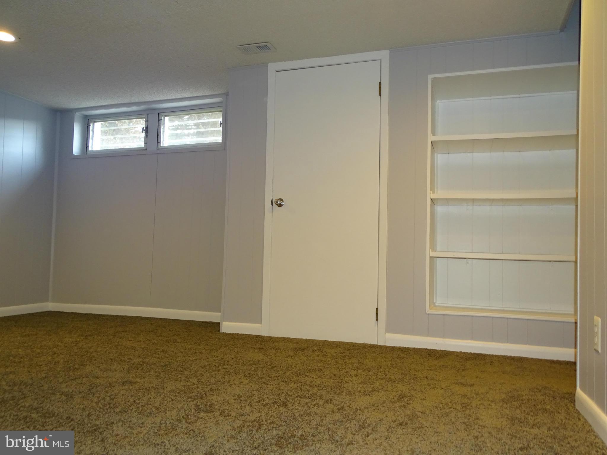 6106 Mt Ridge Road Catonsville, MD 21228 - Photo 23 of 30 a view of an empty room with a window