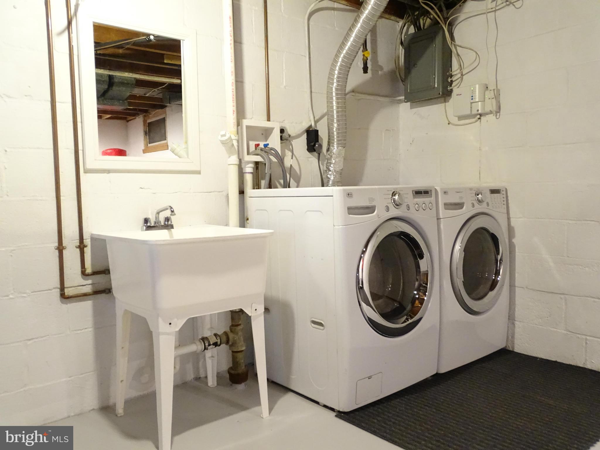 6106 Mt Ridge Road Catonsville, MD 21228 - Photo 26 of 30 a utility room with dryer and washer