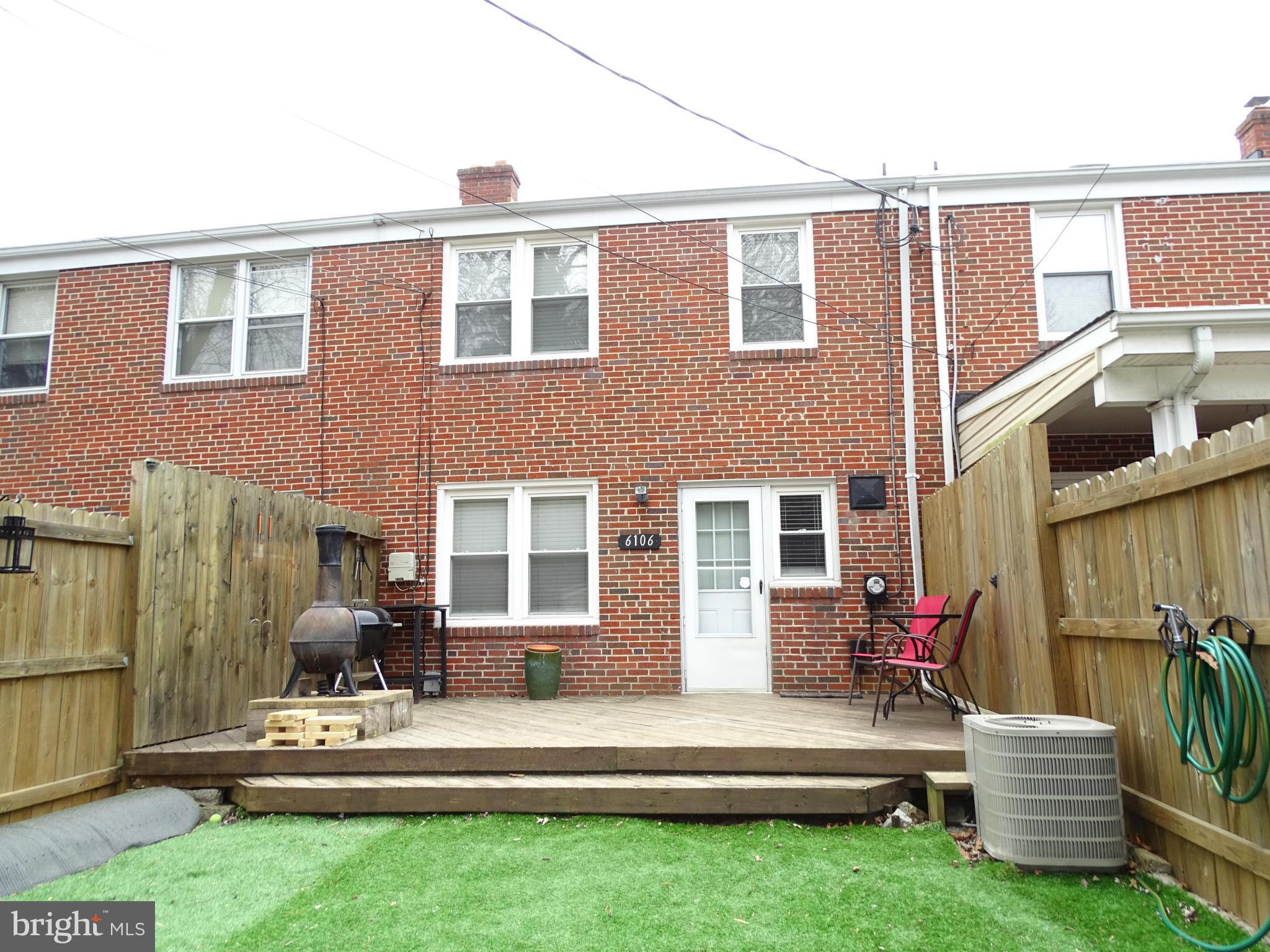 6106 Mt Ridge Road Catonsville, MD 21228 - Photo 30 of 30 a view of backyard of house with outdoor seating