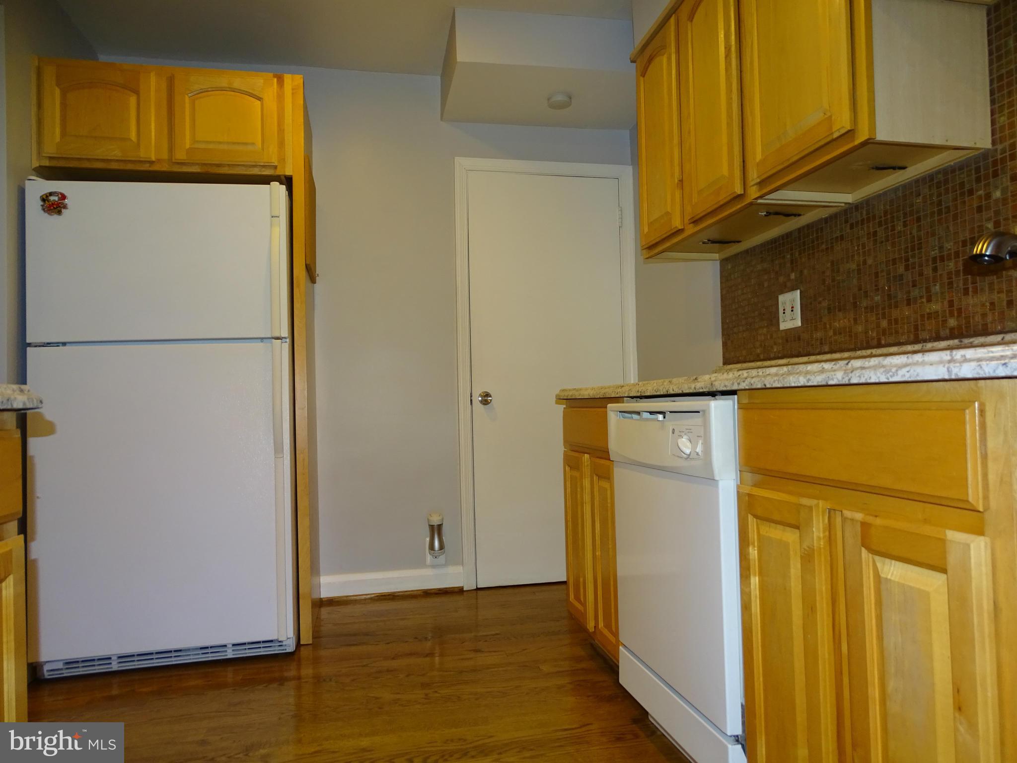 6106 Mt Ridge Road Catonsville, MD 21228 - Photo 10 of 30 a view of a refrigerator in a kitchen
