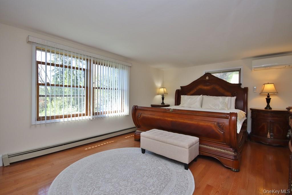 30 Granite Springs Road Granite Springs, NY 10527 - Photo 21 of 37 a bedroom with a bed and window