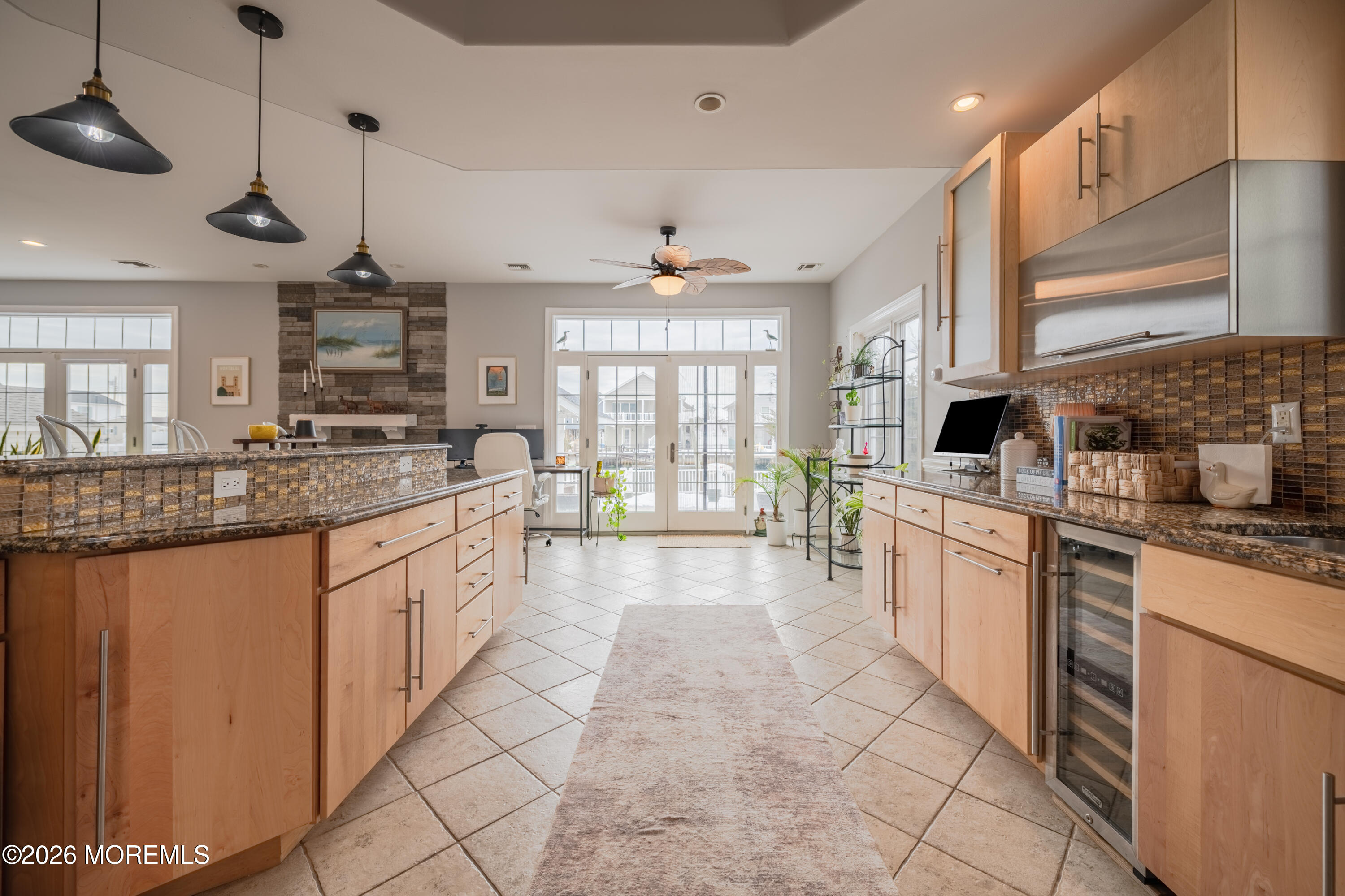 27 West Mohawk Drive Little Egg Harbor, NJ 08087 - Photo 19 of 63 a large kitchen with kitchen island granite countertop a large counter top a sink a window and stainless steel appliances