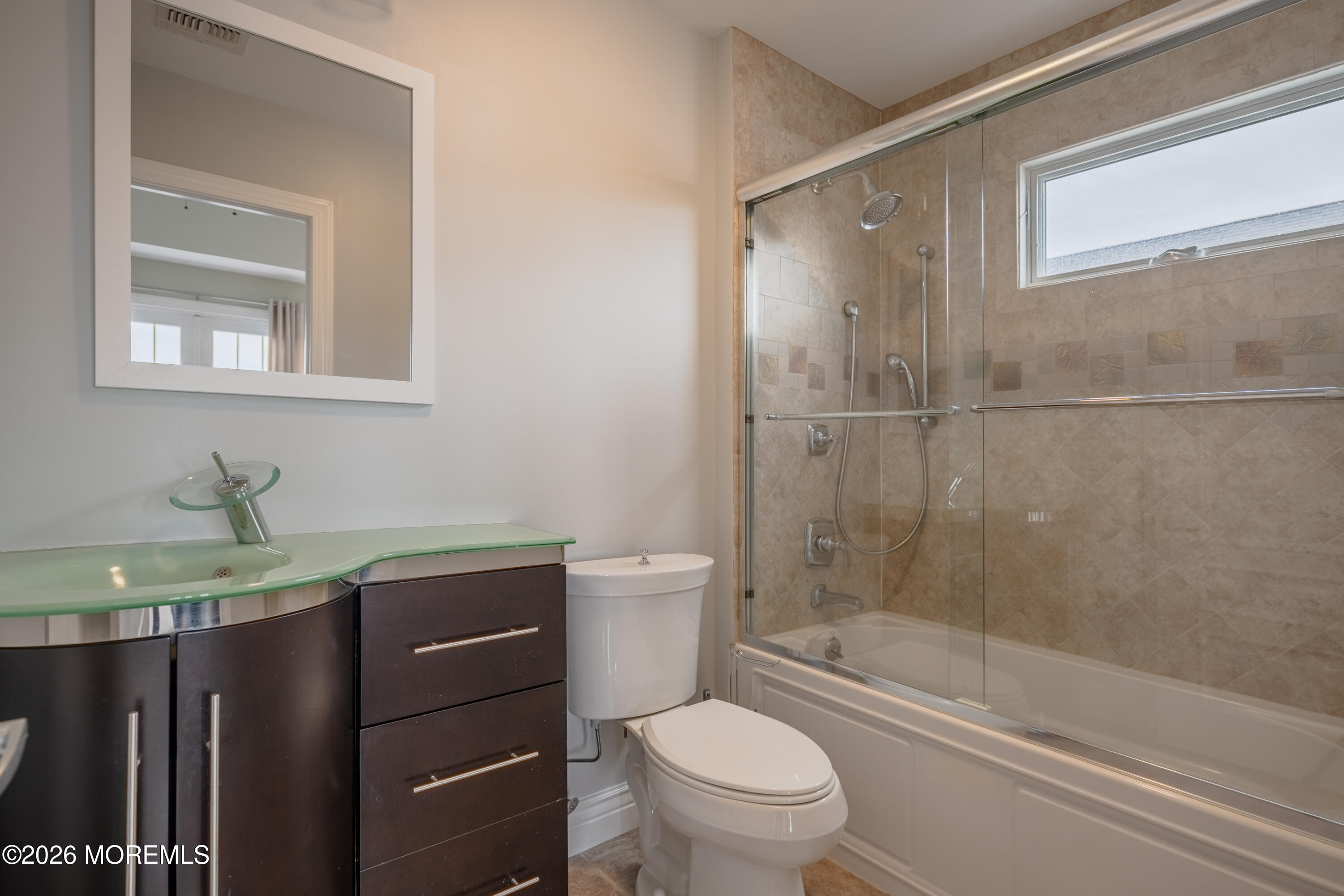 27 West Mohawk Drive Little Egg Harbor, NJ 08087 - Photo 38 of 63 a bathroom with a granite countertop sink toilet and shower