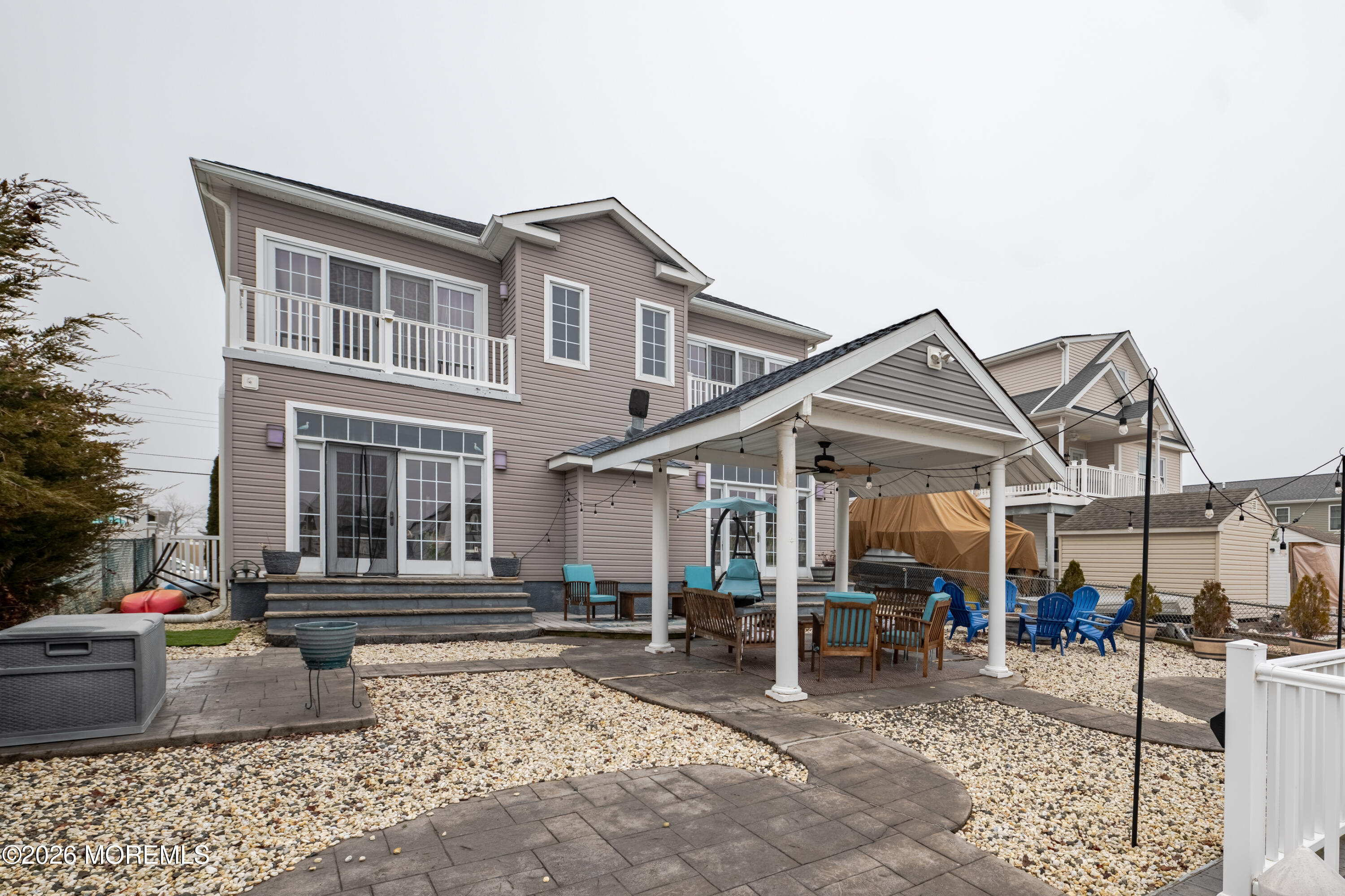 27 West Mohawk Drive Little Egg Harbor, NJ 08087 - Photo 49 of 63 a view of a house with a patio