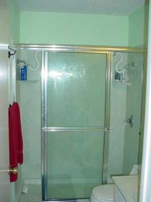 1453 Moore Avenue, Unit C2 Portland, TX 78374 - Photo 7 of 10 a bathroom with a shower