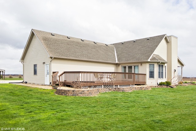 3325 East 19th Road Ottawa, IL 61350 - Photo 14 of 20 a view of a house with a yard and sitting area