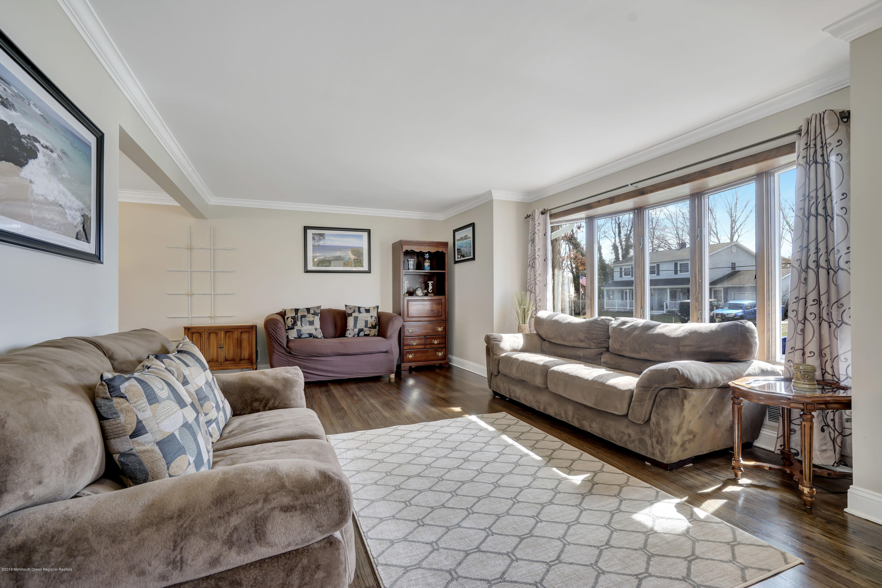 6 High Ridge Road Howell, NJ 07731 - Photo 17 of 40 a living room with furniture and a large window
