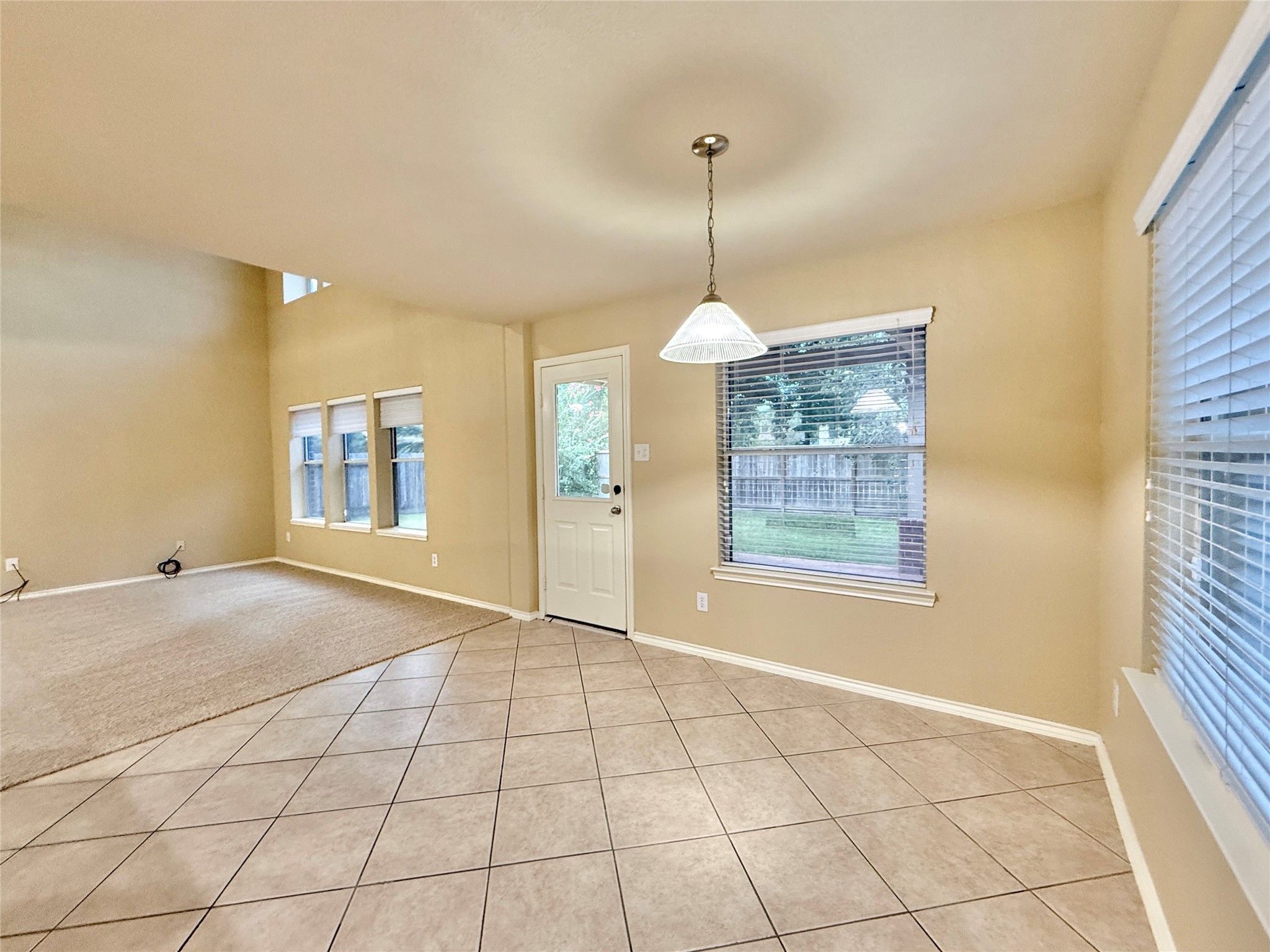 1810 Katlyn Lane Spring, TX 77386 - Photo 11 of 48 Family Room is open to breakfast room / kitchen