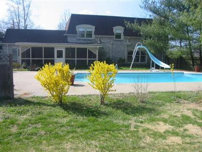 1830 Jacks Creek Road Lexington, KY 40515 - Photo 2 of 13 In-ground gunite pool w/steps and slide.