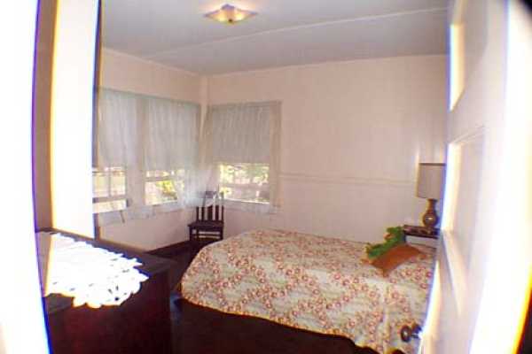 340 Mehana Road Eleele, HI 96705 - Photo 7 of 10 a bedroom with bed and window