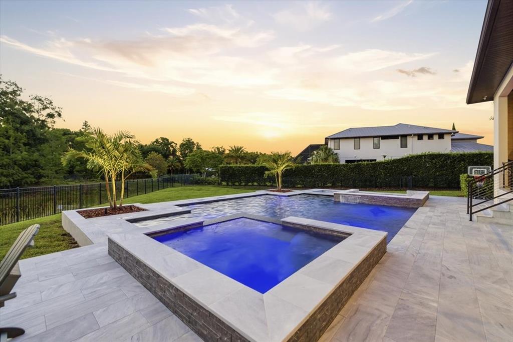 2829 Coastal Range Way Lutz, FL 33559 - Photo 60 of 64 a view of a tennis ground with a table