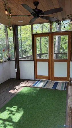 a view of yard from a big room