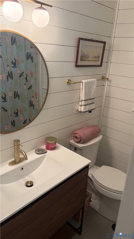 2502 Brookwood Road Richmond, VA 23235 - Photo 42 of 54 a bathroom with a sink toilet and mirror