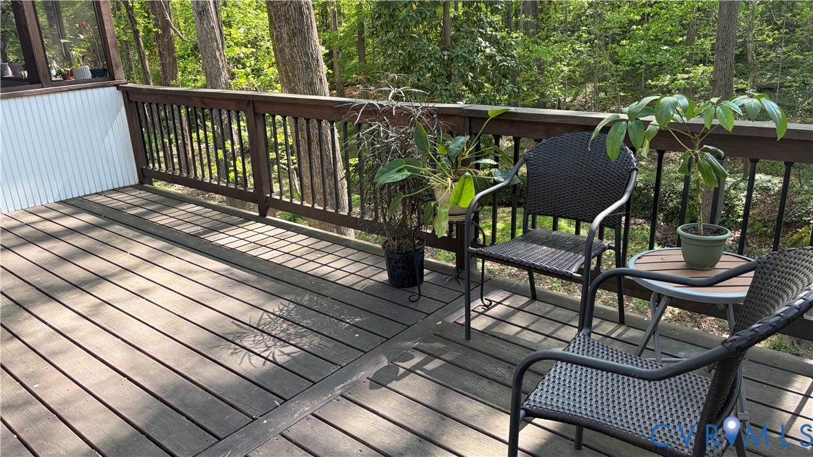 2502 Brookwood Road Richmond, VA 23235 - Photo 49 of 54 a view of balcony with wooden floor and outdoor seating