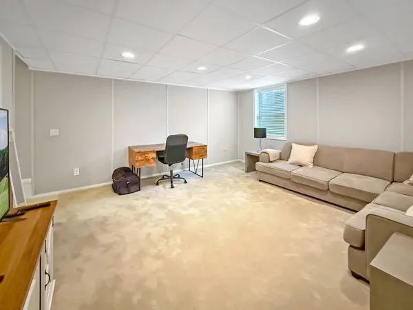 a view of a livingroom with wooden floor