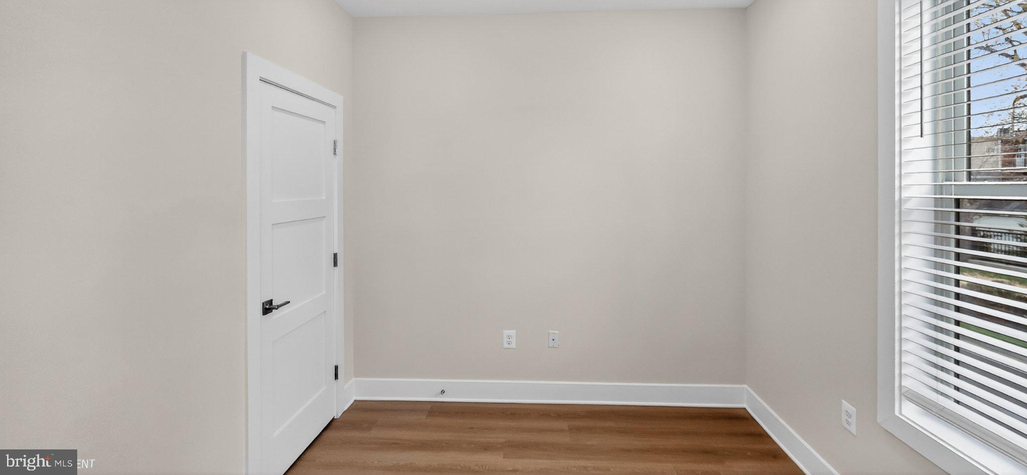 426 Chapel Alley, Unit 8 Frederick, MD 21701 - Photo 8 of 34 a view of small space with wooden floor
