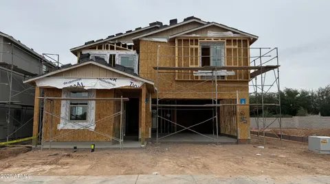 a front view of a house with garage